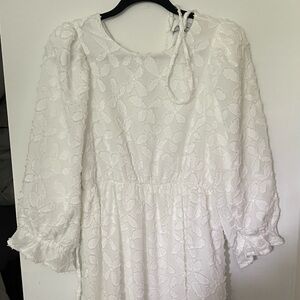 Beautiful white polagram detailed dress!